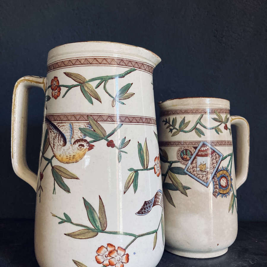 A pair of Wedgwood & Co jugs.