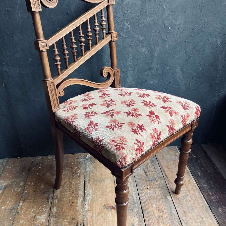 A decorative occasional chair.