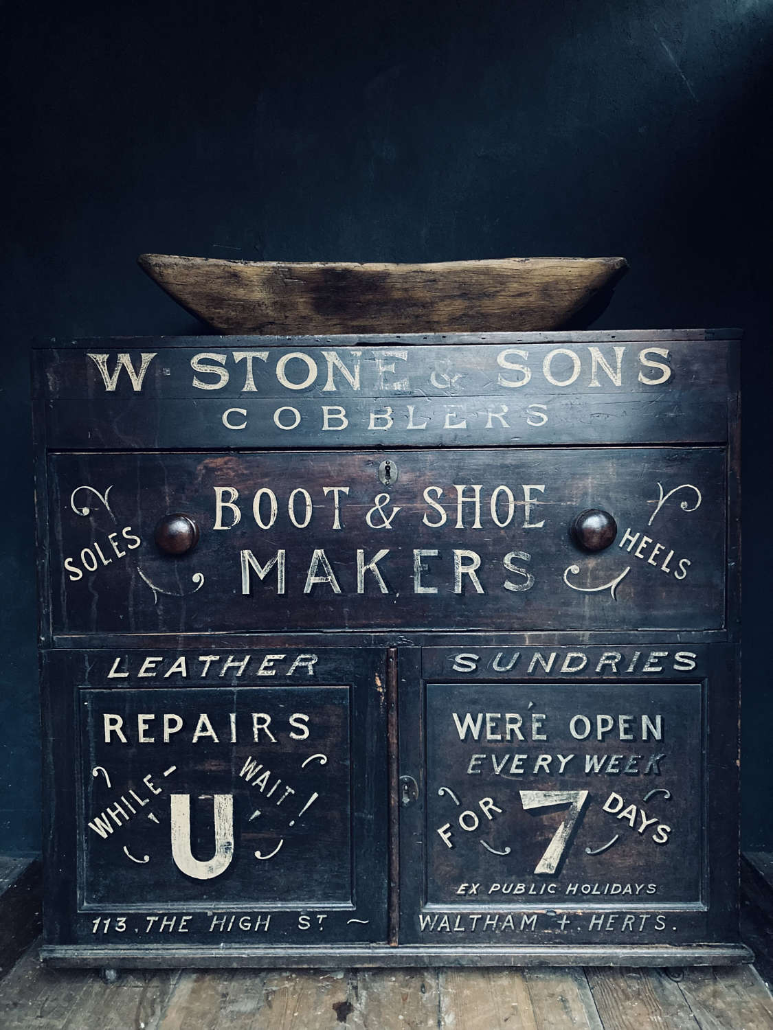 Bootmaker's cupboard.