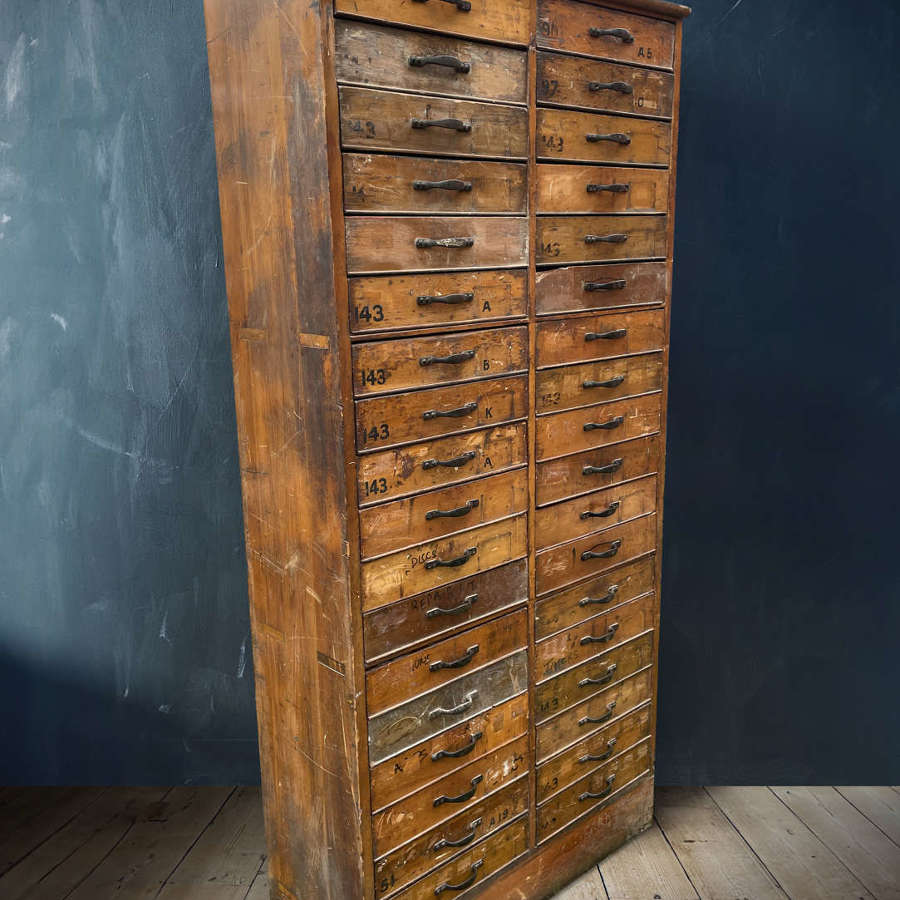 A large cabinet of 36 drawers.